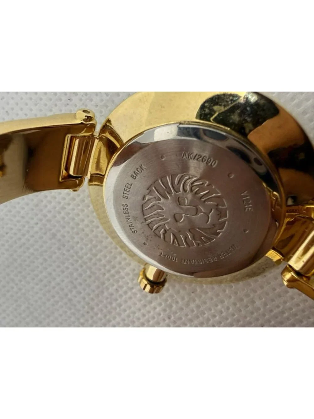 Anne Klein Women's Gold-Tone Cream Dial Marble Acetate Bracelet Watch AK/2690